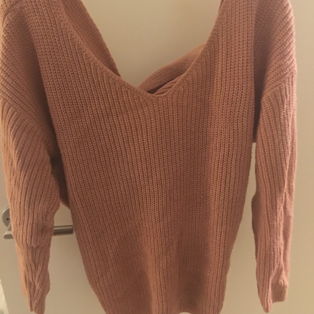 Blush colored twist back sweater